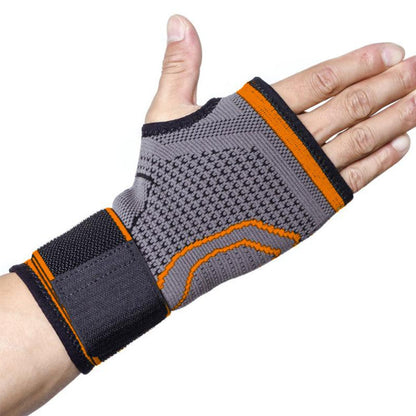 Handledsstöd med kompression och tumgrepp Orange